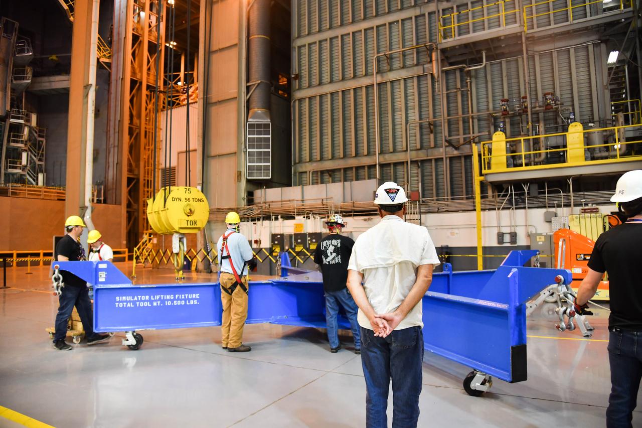 The Space Launch System (SLS) rocket’s liquid oxygen tank structural test article was manufactured and stacked in June 2019 at NASA’s Michoud Assembly Facility in New Orleans. To construct the test article, Boeing technicians at Michoud moved the liquid oxygen tank to the Vertical Assemby Building stacking and integration area. Here, they added simulators to mimic the two structures that connect to the tank, the intertank and the forward skirt.  This structural hardware for the SLS core stage for America’s new deep space rocket is structurally identical to the flight version of the tank. It will be shipped on the Pegasus barge to NASA’s Marshall Space Flight Center in Hunstville, Alabama, where it will undergo a series of tests that simulate the stresses and loads of liftoff and flight. These tests will help ensure designs are adequate for successful SLS missions to the Moon and beyond. The flight liquid oxygen tank along with the liquid hydrogen tank supplies more than 500,000 gallons of propellant to the core stages four RS-25 engines, which produce 2 million pounds of thrust to help send the SLS rocket to space.